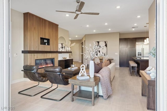 120 Los Cabos Dr Unit 301, Las Vegas, NV 89144 - living room featuring a ceiling fan, recessed lighting, and a glass covered fireplace