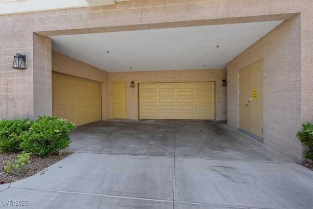 120 Los Cabos Dr Unit 301, Las Vegas, NV 89144 - garage with concrete driveway