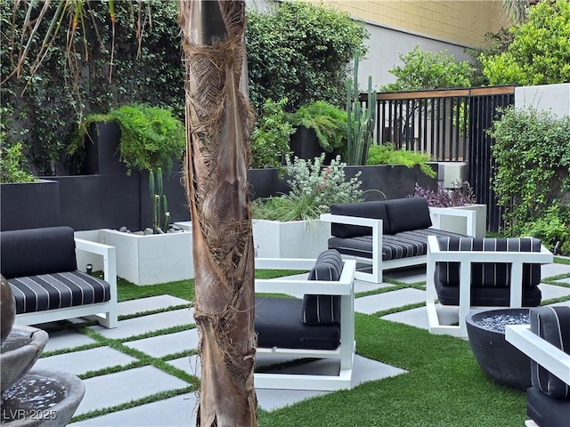 4471 Dean Martin Dr Unit 1104, Las Vegas, NV 89103 - view of yard featuring an outdoor living space and a patio