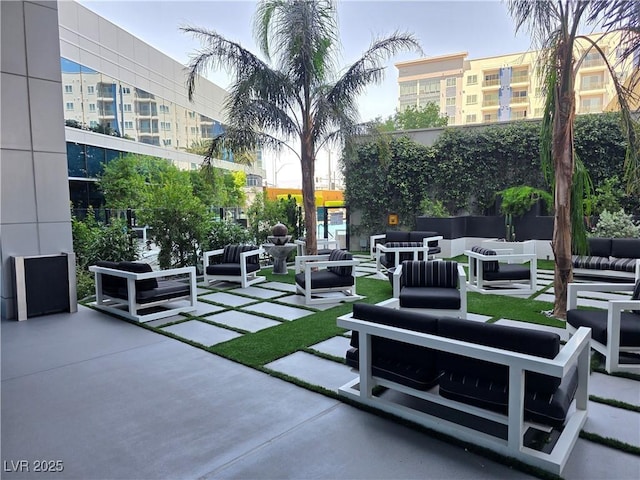 4471 Dean Martin Dr Unit 1104, Las Vegas, NV 89103 - view of home's community featuring an outdoor living space and a patio