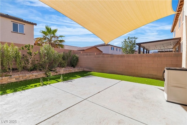 5425 Pride Mountain St, North Las Vegas, NV 89031 - fenced backyard featuring a patio