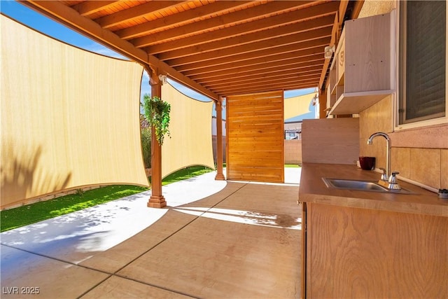 5425 Pride Mountain St, North Las Vegas, NV 89031 - view of patio featuring a sink