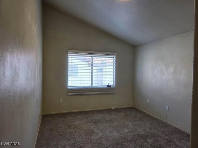 1739 N Lamont St, Las Vegas, NV 89115 - empty room featuring vaulted ceiling and carpet floors