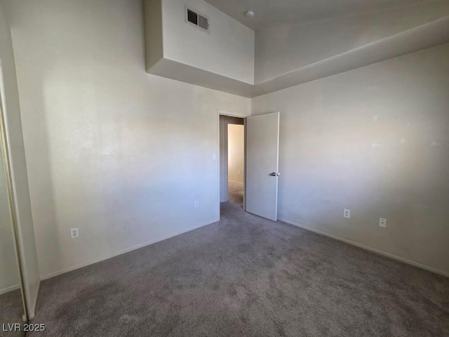 1739 N Lamont St, Las Vegas, NV 89115 - empty room with carpet floors and baseboards