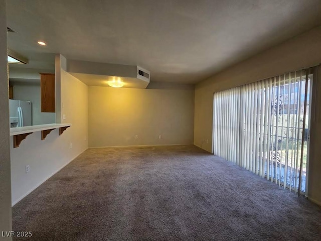 1739 N Lamont St, Las Vegas, NV 89115 - unfurnished room with plenty of natural light, carpet flooring, and recessed lighting