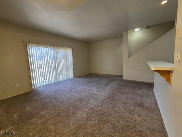 1739 N Lamont St, Las Vegas, NV 89115 - unfurnished living room with carpet flooring and recessed lighting