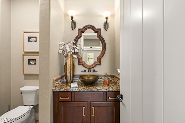 9747 Cathedral Pines Ave, Las Vegas, NV 89149 - half bathroom featuring vanity and toilet