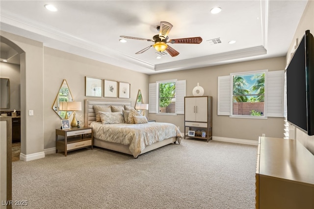 9747 Cathedral Pines Ave, Las Vegas, NV 89149 - bedroom with a tray ceiling, light carpet, crown molding, recessed lighting, and a ceiling fan
