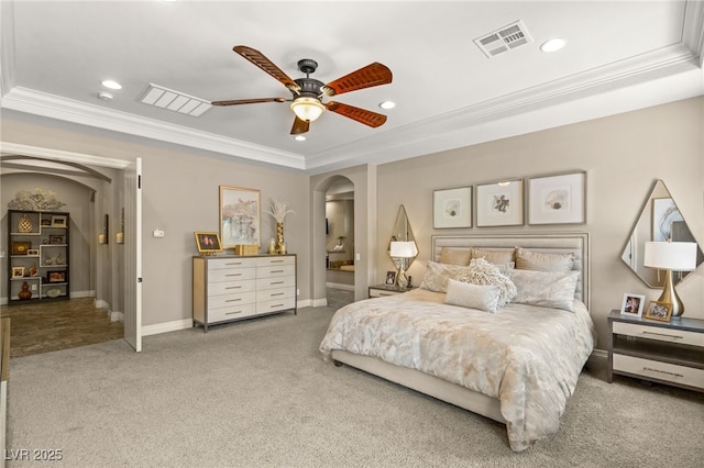 9747 Cathedral Pines Ave, Las Vegas, NV 89149 - carpeted bedroom with arched walkways, crown molding, a tray ceiling, recessed lighting, and a ceiling fan