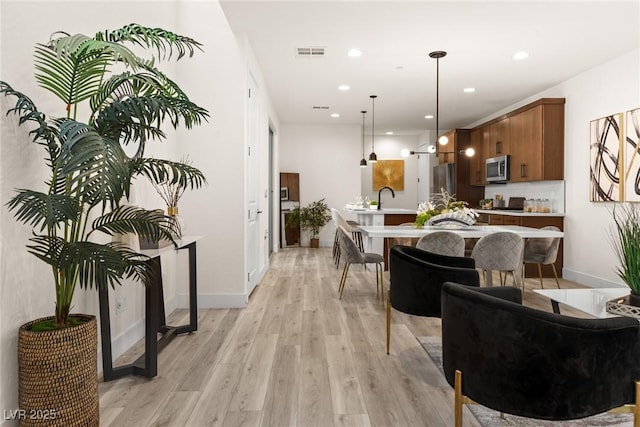 11756 Emerald Lake Ave, Las Vegas, NV 89138 - living room with light wood-style flooring and recessed lighting
