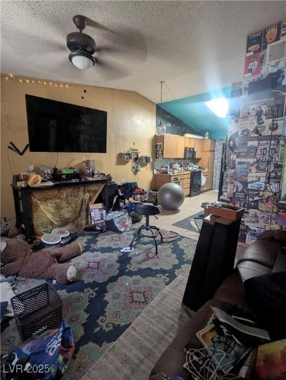 4238 Rollingstone Dr, Las Vegas, NV 89103 - carpeted living area featuring lofted ceiling, a textured ceiling, and a ceiling fan