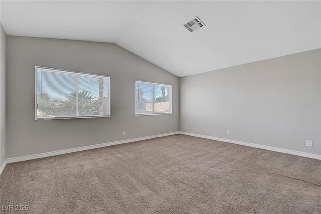 901 Carnival Ave, Las Vegas, NV 89123 - carpeted spare room with vaulted ceiling and baseboards