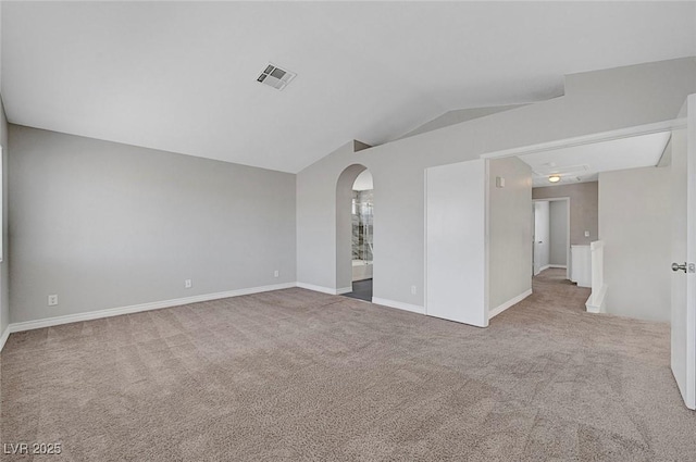 901 Carnival Ave, Las Vegas, NV 89123 - empty room with carpet floors, lofted ceiling, and arched walkways