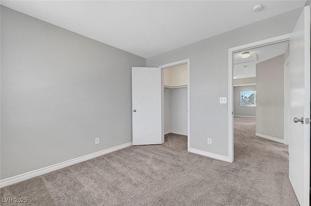 901 Carnival Ave, Las Vegas, NV 89123 - unfurnished bedroom featuring carpet floors, a walk in closet, and a closet