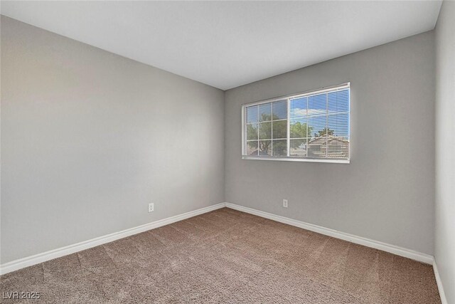 901 Carnival Ave, Las Vegas, NV 89123 - empty room with carpet and baseboards
