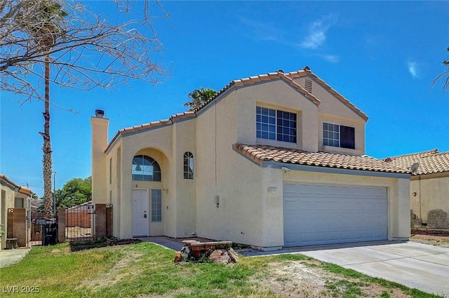 901 Carnival Ave, Las Vegas, NV 89123 - mediterranean / spanish house featuring a tiled roof, stucco siding, a chimney, a garage, and a gate