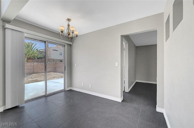 901 Carnival Ave, Las Vegas, NV 89123 - empty room featuring a chandelier and baseboards