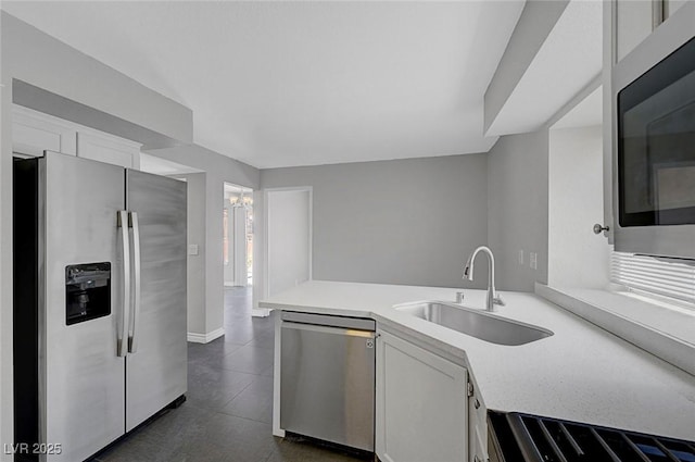 901 Carnival Ave, Las Vegas, NV 89123 - kitchen with appliances with stainless steel finishes, white cabinets, and light countertops