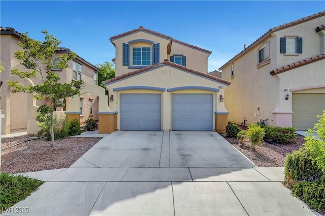 2431 Lilac Cove St, Las Vegas, NV 89135 - mediterranean / spanish home with a tiled roof, driveway, stucco siding, and a garage