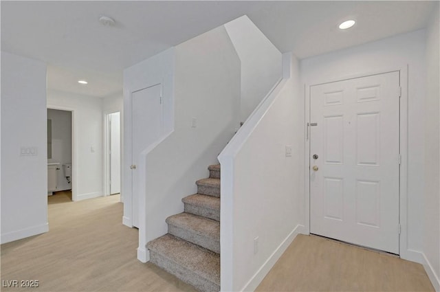 2431 Lilac Cove St, Las Vegas, NV 89135 - foyer entrance featuring light wood-style flooring, stairway, and recessed lighting