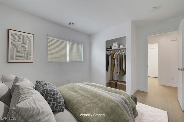 2431 Lilac Cove St, Las Vegas, NV 89135 - bedroom featuring a closet and wood finished floors