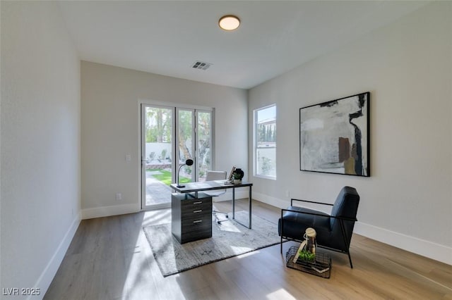 5573 San Florentine Ave, Las Vegas, NV 89141 - home office with wood finished floors and baseboards