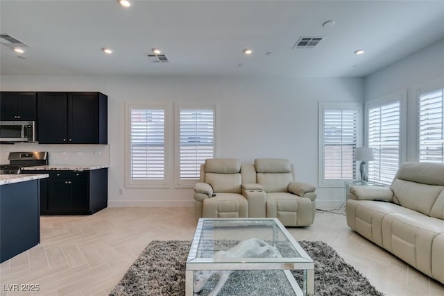 9844 Kings Glen St, Las Vegas, NV 89141 - living area with healthy amount of natural light and recessed lighting