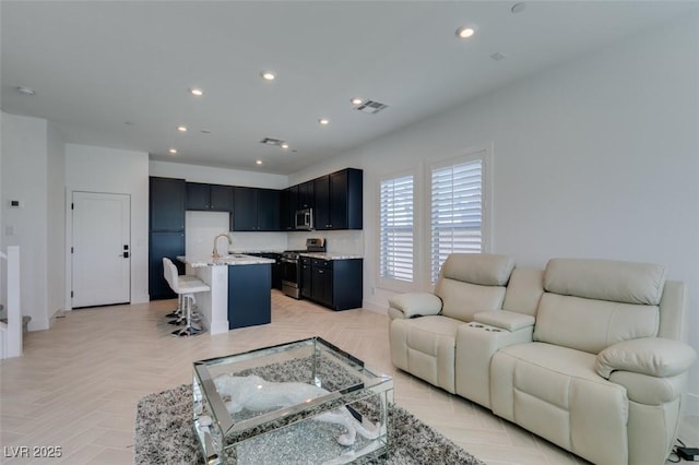 9844 Kings Glen St, Las Vegas, NV 89141 - living room with recessed lighting