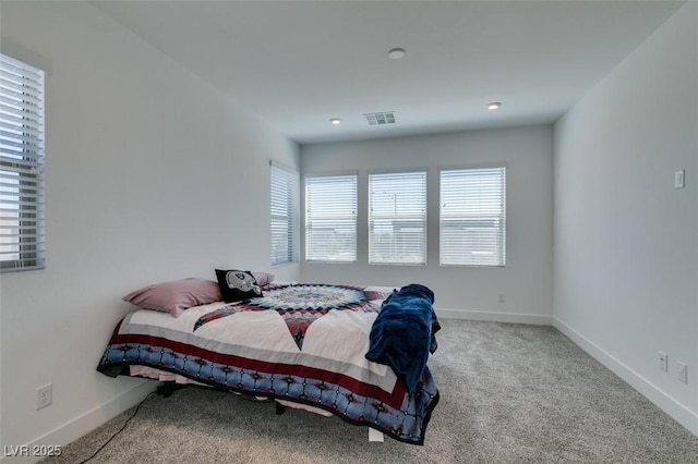 9844 Kings Glen St, Las Vegas, NV 89141 - bedroom featuring multiple windows and carpet