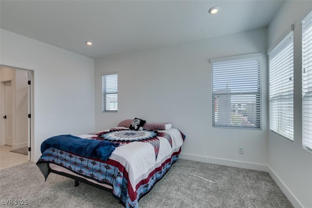 9844 Kings Glen St, Las Vegas, NV 89141 - carpeted bedroom featuring multiple windows and recessed lighting