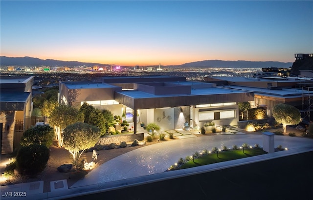 671 Scenic Rim Dr, Henderson, NV 89012 - rear view of property featuring a mountain view and stucco siding