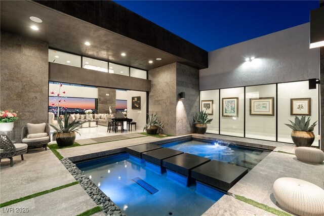 671 Scenic Rim Dr, Henderson, NV 89012 - indoor pool featuring an in-ground hot tub and a patio