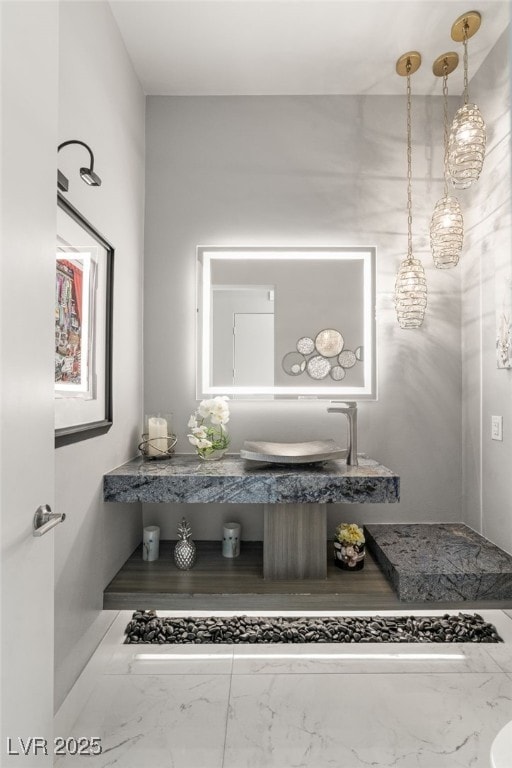 671 Scenic Rim Dr, Henderson, NV 89012 - bathroom featuring marble look tiles