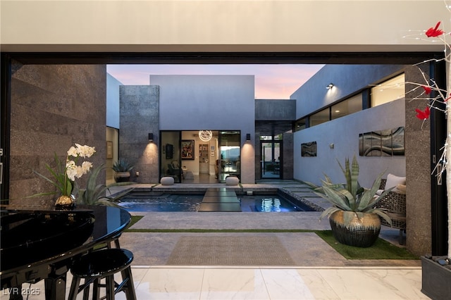671 Scenic Rim Dr, Henderson, NV 89012 - swimming pool with a jacuzzi and a patio