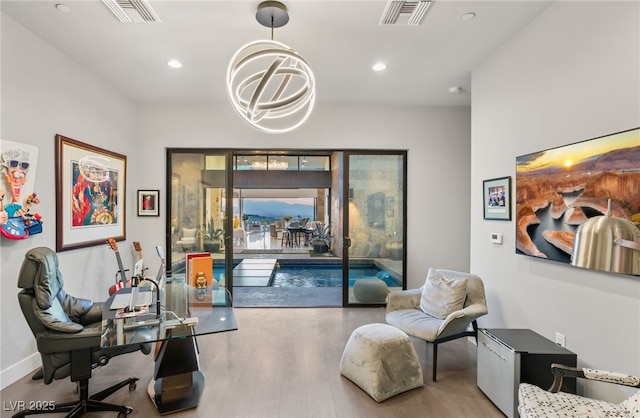 671 Scenic Rim Dr, Henderson, NV 89012 - office space featuring wood finished floors, a chandelier, and recessed lighting