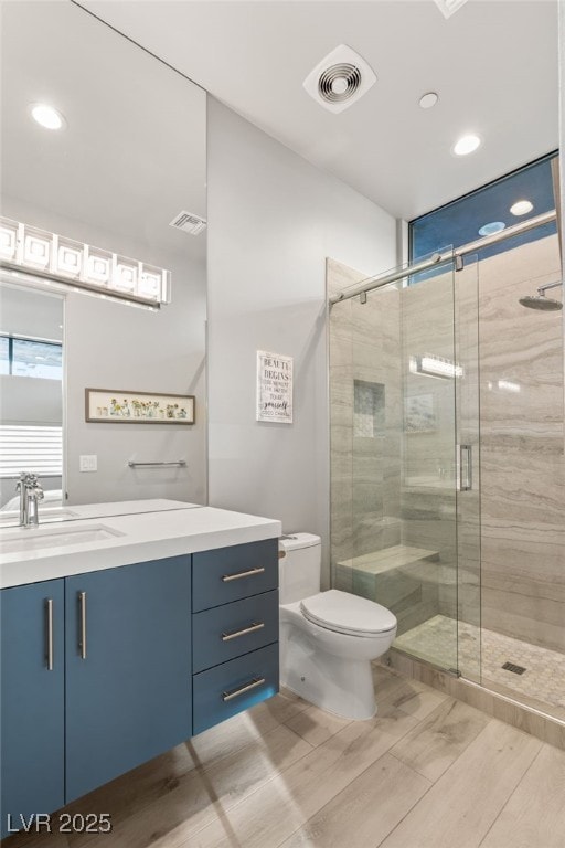 671 Scenic Rim Dr, Henderson, NV 89012 - bathroom featuring vanity, a stall shower, and recessed lighting