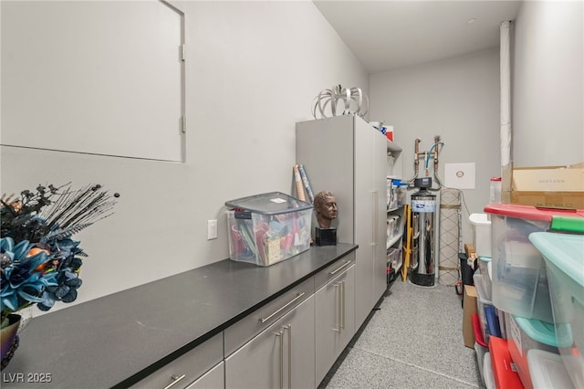 671 Scenic Rim Dr, Henderson, NV 89012 - kitchen with dark speckled floor and dark countertops