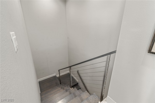 671 Scenic Rim Dr, Henderson, NV 89012 - staircase with baseboards and wood finished floors