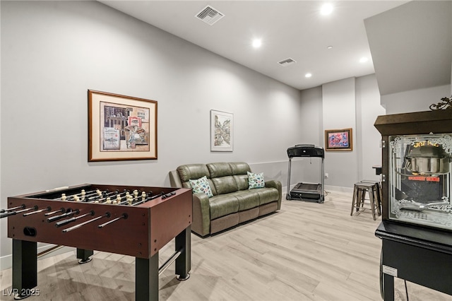671 Scenic Rim Dr, Henderson, NV 89012 - game room with wood finished floors and recessed lighting