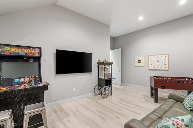 671 Scenic Rim Dr, Henderson, NV 89012 - living area featuring wood finished floors, recessed lighting, and lofted ceiling