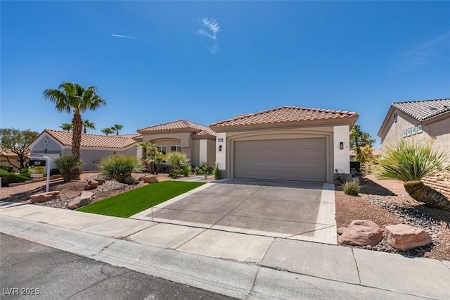 9425 Villa Ridge Dr, Las Vegas, NV 89134 - mediterranean / spanish-style home with stucco siding, a tiled roof, concrete driveway, and an attached garage