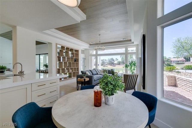 9425 Villa Ridge Dr, Las Vegas, NV 89134 - sunroom featuring a chandelier and healthy amount of natural light