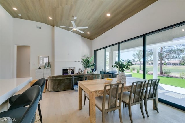 9425 Villa Ridge Dr, Las Vegas, NV 89134 - dining room featuring high vaulted ceiling, a ceiling fan, light wood-type flooring, recessed lighting, and wooden ceiling
