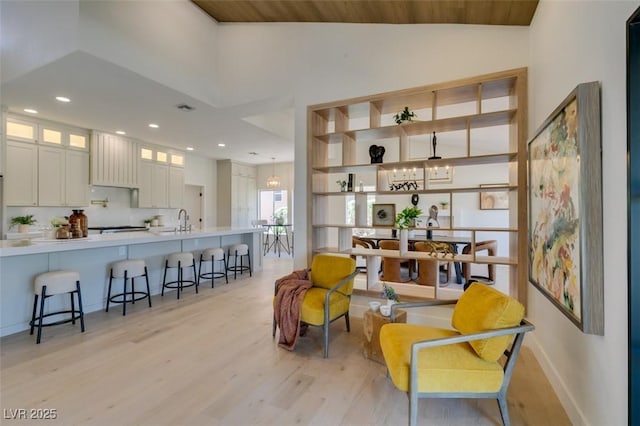 9520 Sundial Dr, Las Vegas, NV 89134 - living area featuring light wood-style floors, recessed lighting, wood ceiling, and vaulted ceiling