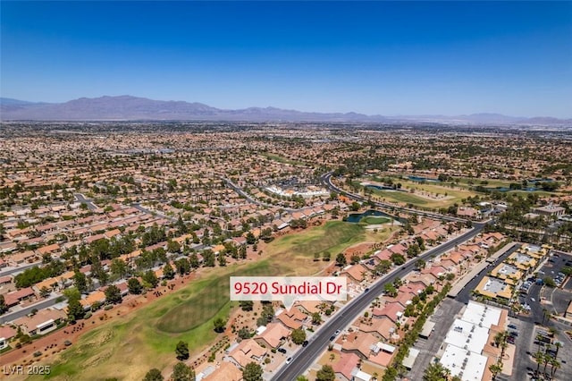 9520 Sundial Dr, Las Vegas, NV 89134 - aerial overview of property's location with a golf course and nearby suburban area