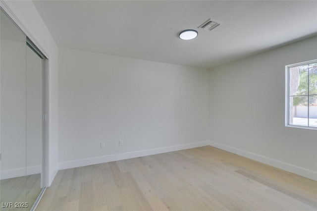 9520 Sundial Dr, Las Vegas, NV 89134 - unfurnished bedroom featuring light wood-style floors and a closet