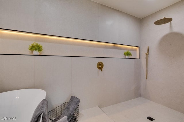 9520 Sundial Dr, Las Vegas, NV 89134 - bathroom with a freestanding bath and tiled shower