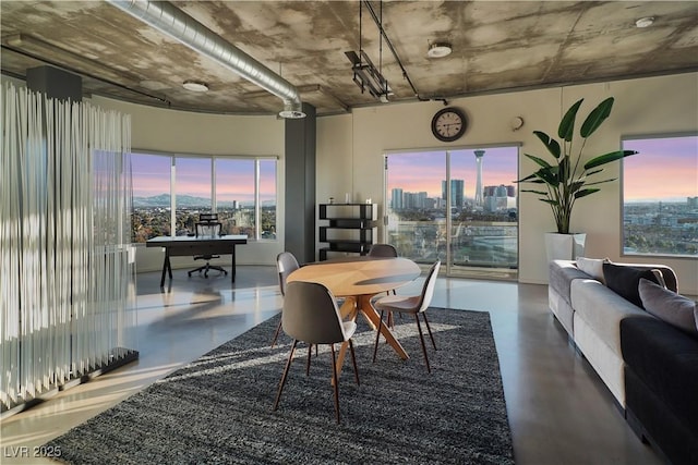 900 Las Vegas Blvd Unit 912, Las Vegas, NV 89101 - dining space featuring a view of skyline and finished concrete flooring