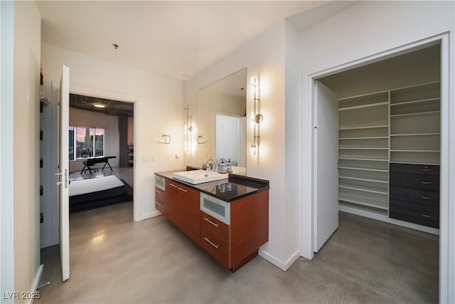 900 Las Vegas Blvd Unit 912, Las Vegas, NV 89101 - bathroom with baseboards and vanity