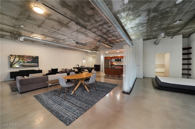 900 Las Vegas Blvd Unit 912, Las Vegas, NV 89101 - dining area featuring finished concrete flooring